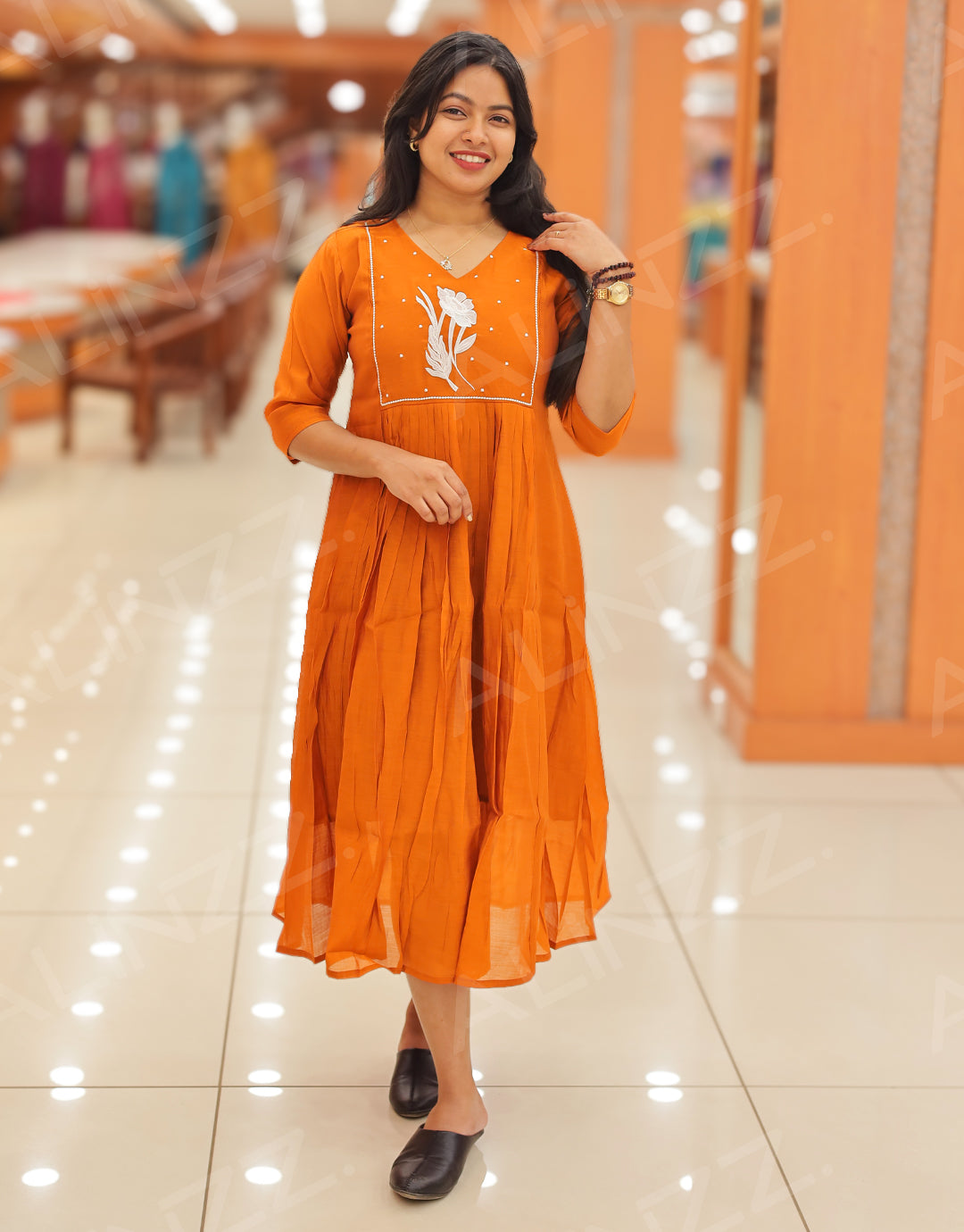 Womens Mul-Chanderi Floral Embroidered A-Line Kurti – R556